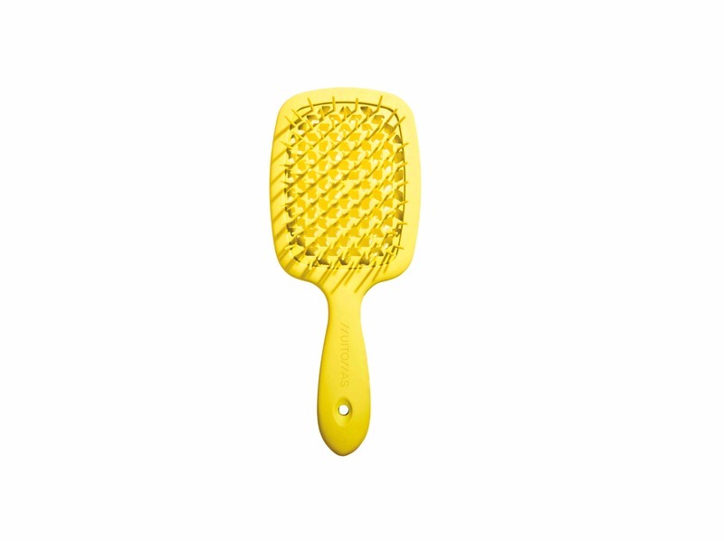 spazzola per capelli gialla